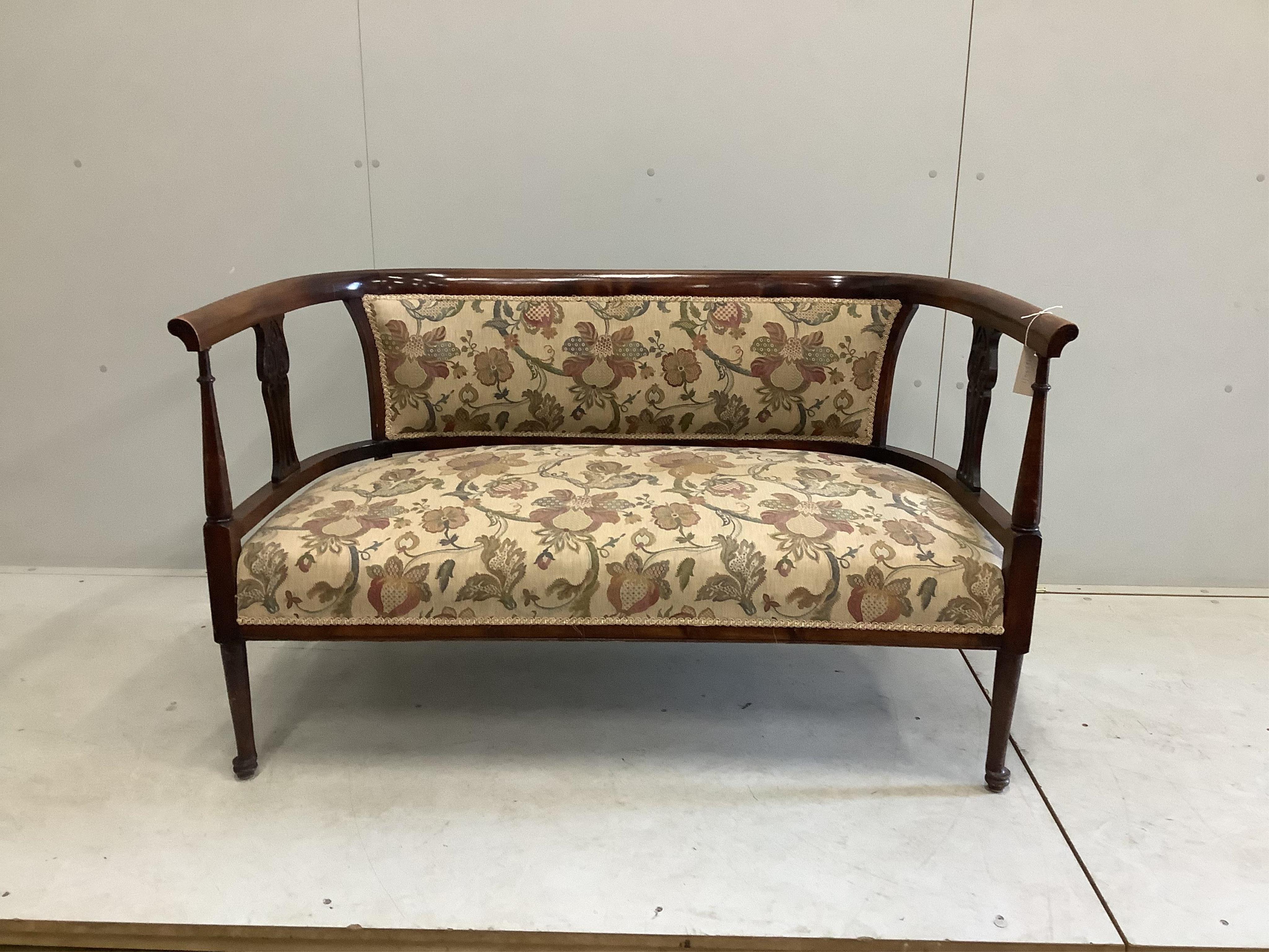 An Edwardian stained beech settee, width 122cm, height 73cm. Condition - fair